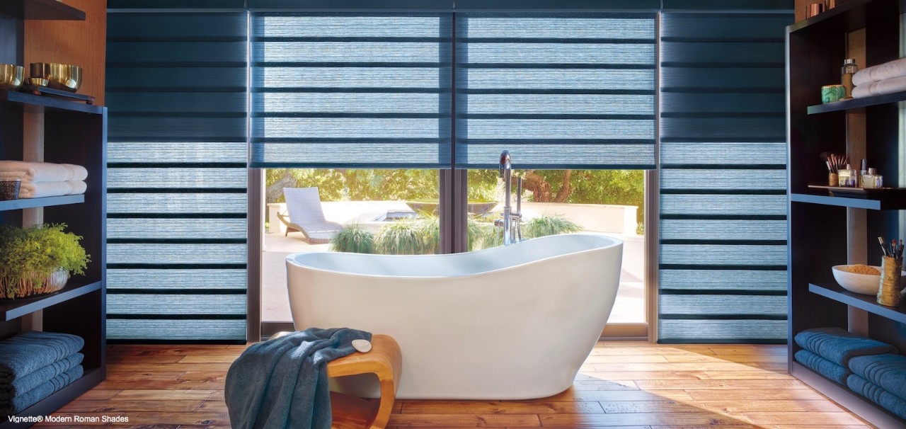 A large bathroom with tub.